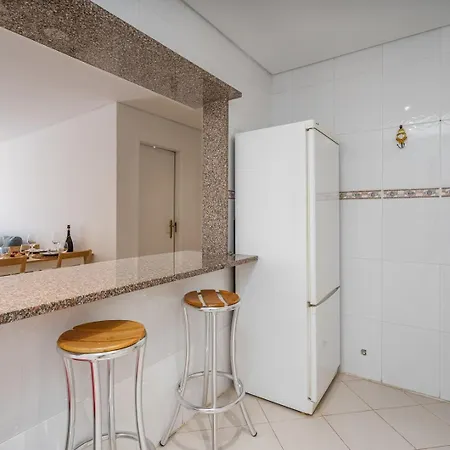 Apartmán Hostwise - Sunny Escape With A Pool & Balcony